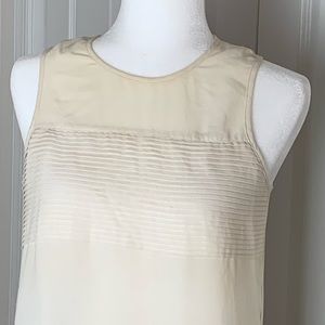 Naked Zebra cream sleeveless blouse